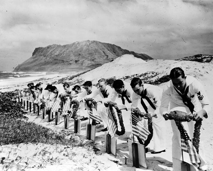 SeamenatKaneoheNASdecorategravesofPearlHarborvictims